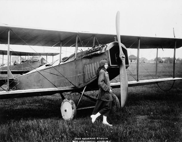 Katherine Stinson, as a nineteen year-old, preparing for a flight from Buffalo to Washington, D.C., in connection with the American Red Cross week.